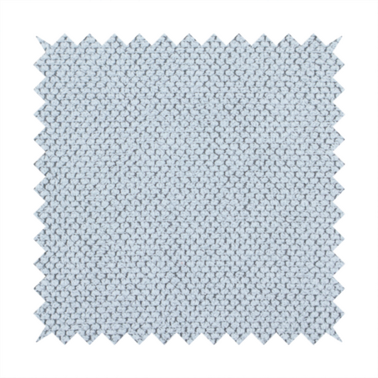 A premium pale ice blue waffle-knit fabric, showcasing a crisp, structured, and sophisticated honeycomb texture.