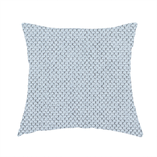 The fabric used to create this handmade cushion is a premium pale ice blue waffle-knit fabric, showcasing a crisp, structured, and sophisticated honeycomb texture.