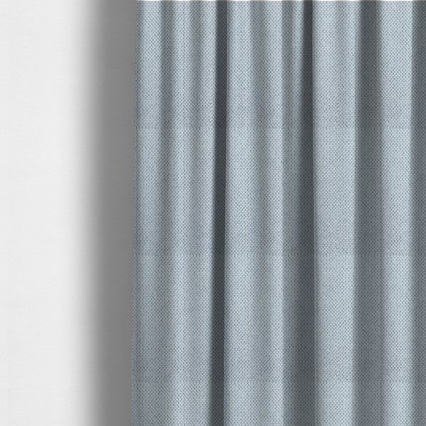 The fabric used to create these made-to-measure curtains is a premium pale ice blue waffle-knit fabric, showcasing a crisp, structured, and sophisticated honeycomb texture.