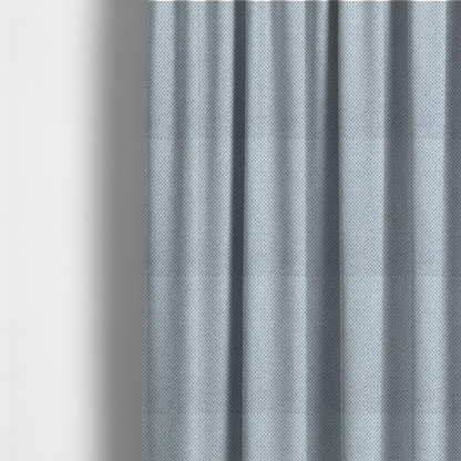 The fabric used to create these made-to-measure curtains is a premium pale ice blue waffle-knit fabric, showcasing a crisp, structured, and sophisticated honeycomb texture.