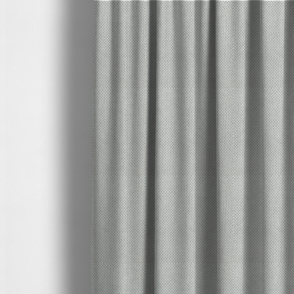 The fabric used to create these made-to-measure curtains is a premium light grey or off-white waffle-knit fabric, featuring a crisp, structured, and sophisticated honeycomb texture.