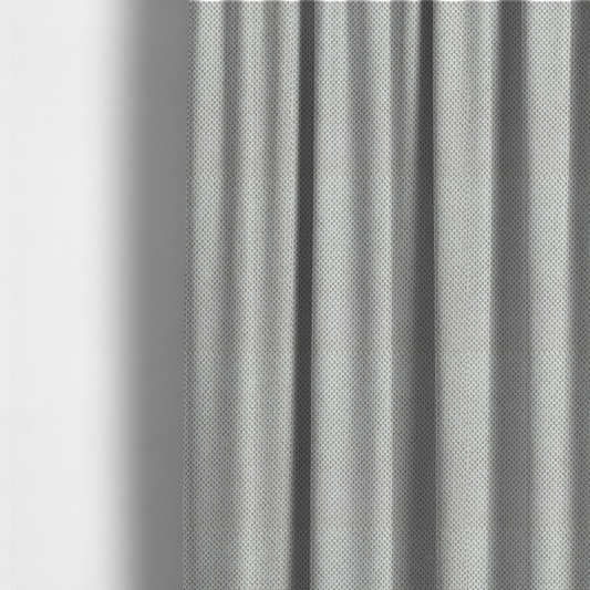 The fabric used to create these made-to-measure curtains is a premium light grey or off-white waffle-knit fabric, featuring a crisp, structured, and sophisticated honeycomb texture.