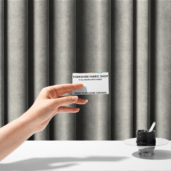 The fabric used to create these made-to-measure curtains is a premium off-white/cream waffle-knit fabric, featuring a crisp, clean, three-dimensional honeycomb weave with a soft finish.