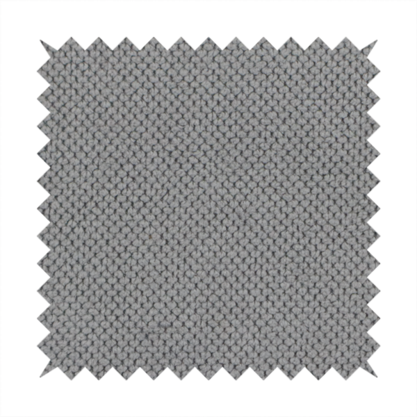 A light grey upholstery fabric. The material features a tightly woven, multidimensional texture that creates a soft, grainy appearance across the entire surface.