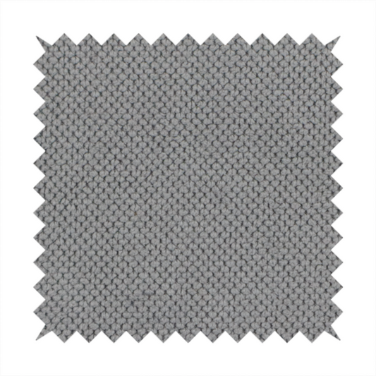 A light grey upholstery fabric. The material features a tightly woven, multidimensional texture that creates a soft, grainy appearance across the entire surface.