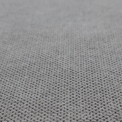 A light grey upholstery fabric. The material features a tightly woven, multidimensional texture that creates a soft, grainy appearance across the entire surface.