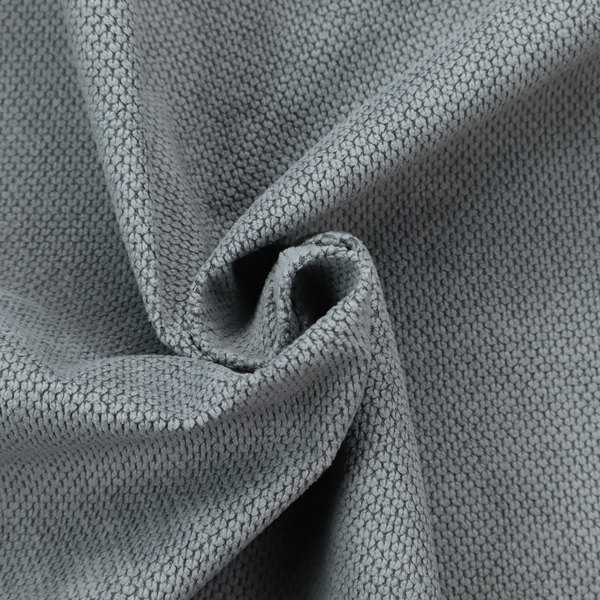 A premium cool grey waffle-knit fabric, featuring a crisp, clean, three-dimensional honeycomb weave.
