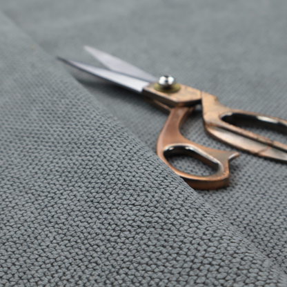 A premium cool grey waffle-knit fabric, featuring a crisp, clean, three-dimensional honeycomb weave.