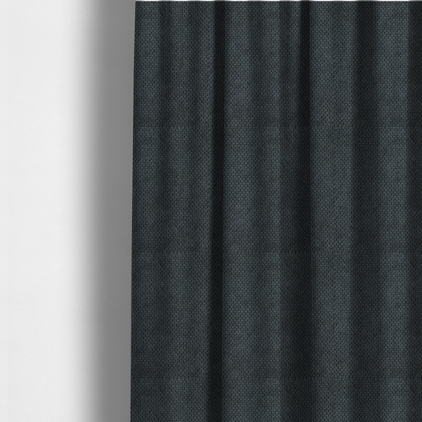 The fabric used to create these made-to-measure curtains is a premium charcoal grey waffle-knit fabric, featuring a dense, three-dimensional honeycomb weave for a sophisticated, modern aesthetic.