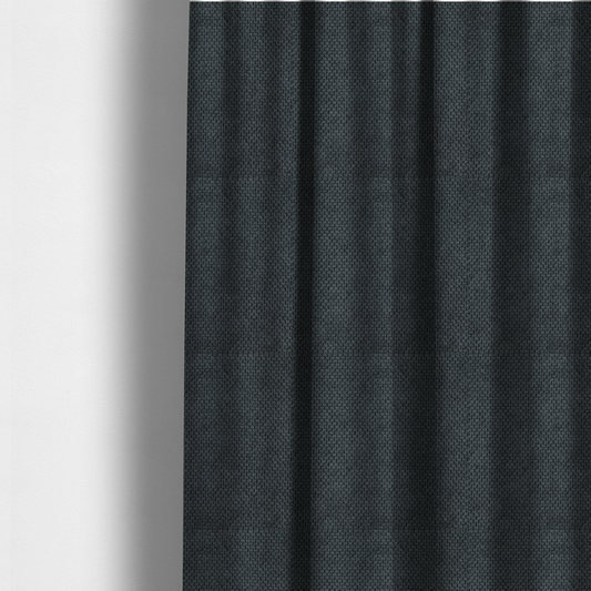 The fabric used to create these made-to-measure curtains is a premium charcoal grey waffle-knit fabric, featuring a dense, three-dimensional honeycomb weave for a sophisticated, modern aesthetic.