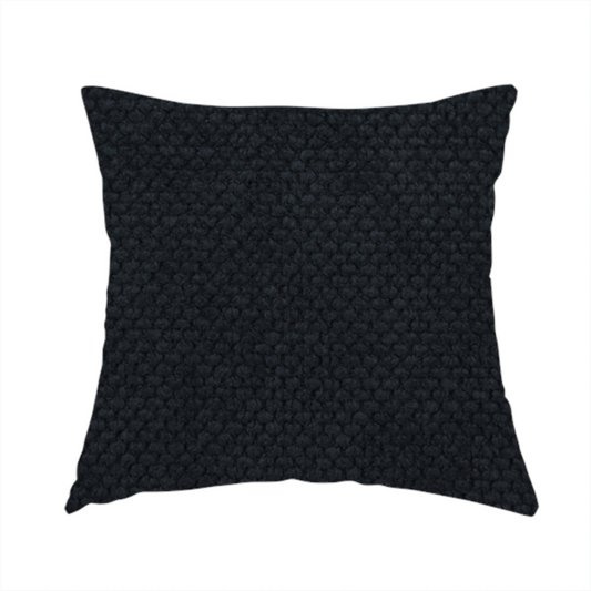 The fabric used to create these handmade cushions is a premium midnight black waffle-knit fabric, showcasing a refined, dense, and uniform three-dimensional honeycomb texture.