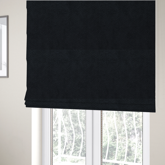 The fabric used to create these Roman blinds is a premium midnight black waffle-knit fabric, showcasing a refined, dense, and uniform three-dimensional honeycomb texture.
