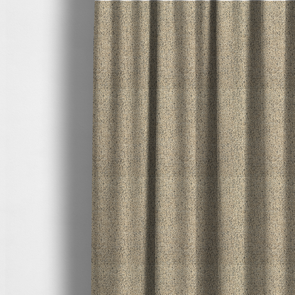 The fabric used to create these made-to-measure curtains is a beige textured fabric with a dense, irregular black speckled pattern.