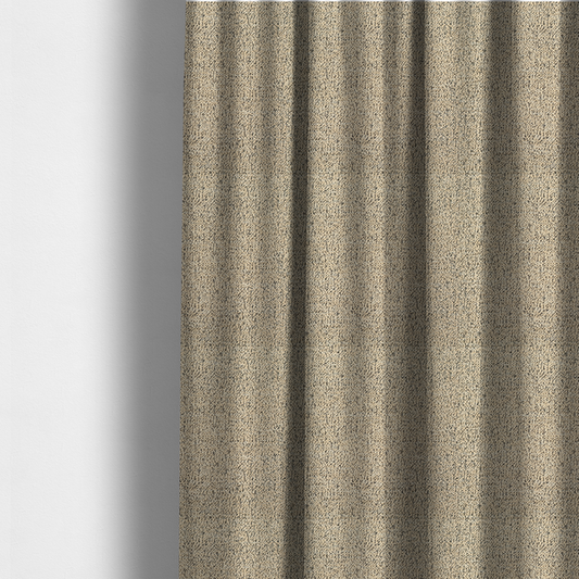 The fabric used to create these made-to-measure curtains is a beige textured fabric with a dense, irregular black speckled pattern.