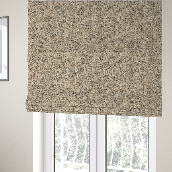 The fabric used to create these Roman blinds is a beige textured fabric with a dense, irregular black speckled pattern.