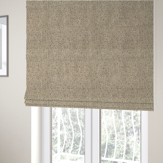 The fabric used to create these Roman blinds is a beige textured fabric with a dense, irregular black speckled pattern.