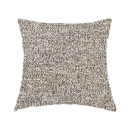 The fabric used to create these handmade cushions is a ash brown textured fabric with a dense, irregular black speckled pattern.