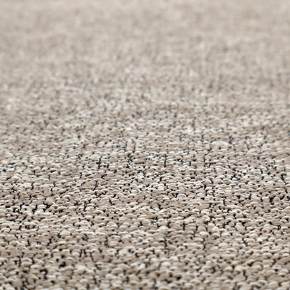 An ash brown textured fabric with a dense, irregular black speckled pattern.