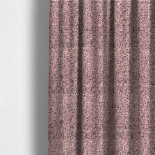 The fabric used to create these made-to-measure curtains is a dusty rose textured fabric with a dense, irregular black speckled pattern.