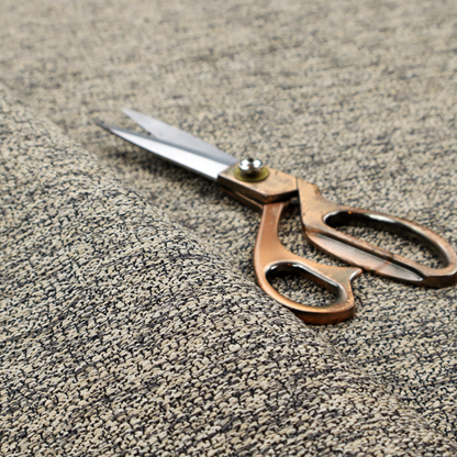 A fossil grey and cream textured fabric with a dense, irregular speckled pattern.