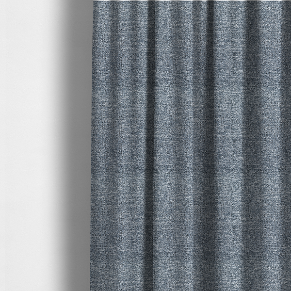 The fabric used to create these made-to-measure curtains is a silver-grey textured fabric with a dense, irregular black speckled pattern.