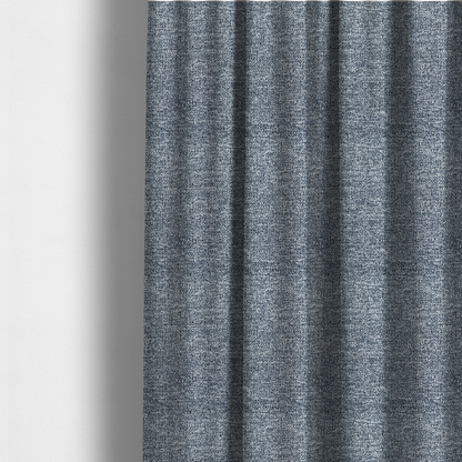 The fabric used to create these made-to-measure curtains is a silver-grey textured fabric with a dense, irregular black speckled pattern.