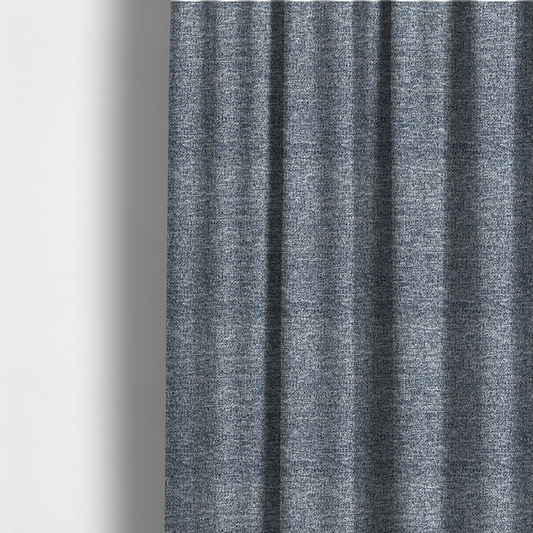 The fabric used to create these made-to-measure curtains is a silver-grey textured fabric with a dense, irregular black speckled pattern.