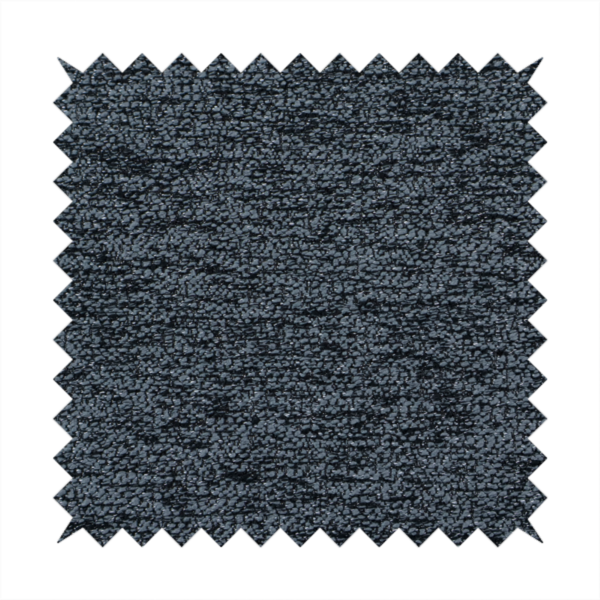 A charcoal grey textured fabric with a dense black speckled pattern, creating a dark, moody salt-and-pepper effect with a heavy pebbled weave.
