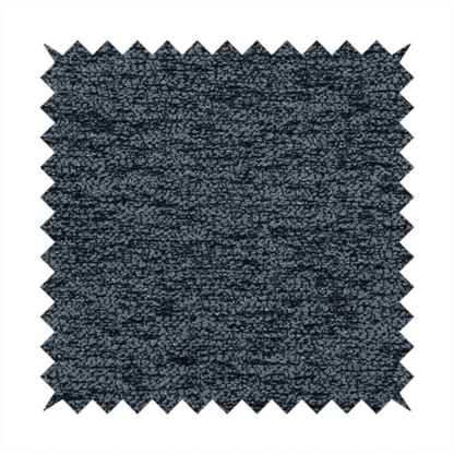 A charcoal grey textured fabric with a dense black speckled pattern, creating a dark, moody salt-and-pepper effect with a heavy pebbled weave.