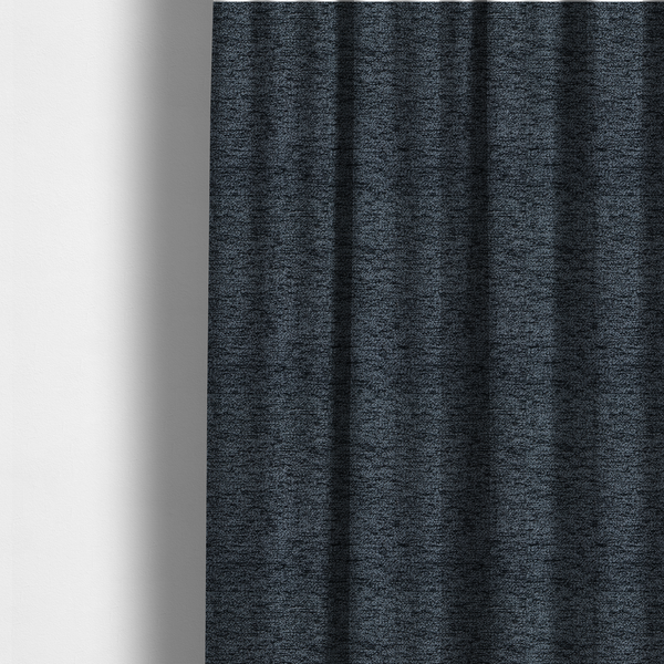 The fabric used to create these made-to-measure curtains is a charcoal grey textured fabric with a dense black speckled pattern, creating a dark, moody salt-and-pepper effect with a heavy pebbled weave.