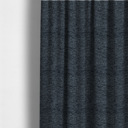 The fabric used to create these made-to-measure curtains is a charcoal grey textured fabric with a dense black speckled pattern, creating a dark, moody salt-and-pepper effect with a heavy pebbled weave.