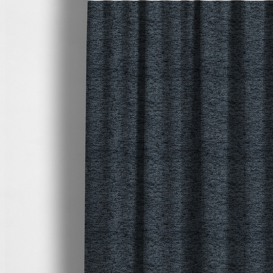 The fabric used to create these made-to-measure curtains is a charcoal grey textured fabric with a dense black speckled pattern, creating a dark, moody salt-and-pepper effect with a heavy pebbled weave.