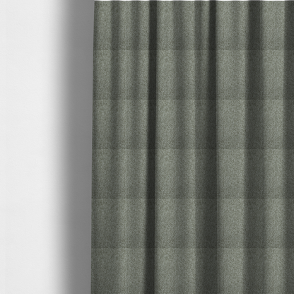 The fabric used to create these made-to-measure curtains is a textured woven upholstery fabric. The material features a dense, multi-tonal weave of sage green, grey, and beige threads, creating a speckled effect with a tactile, matte finish.