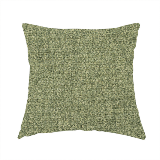 The fabric used to create these handmade cushions is a green Chamonix upholstery fabric. The material features a dense, multi-tonal basket weave texture with a matte finish, ideal for durable and stylish furniture.