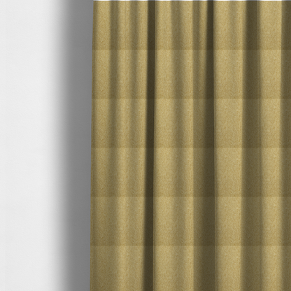 The fabric used to create these made-to-measure curtains is a Chamonix Water Repellent upholstery fabric in Pear Green. A vibrant, citrus-toned material featuring a dense basket weave texture and a durable, matte finish.
