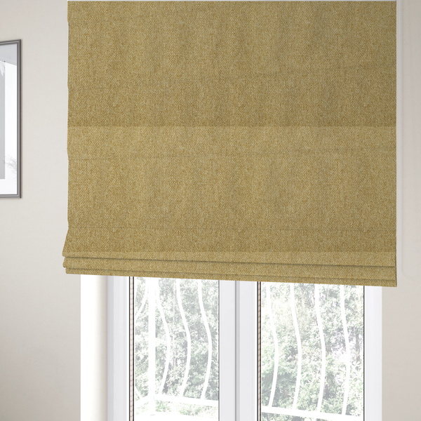 The fabric used to create these Roman blinds is a Chamonix Water Repellent upholstery fabric in Pear Green. A vibrant, citrus-toned material featuring a dense basket weave texture and a durable, matte finish.