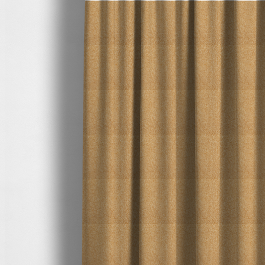 The fabric used to create these made-to-measure curtains is a Chamonix Water Repellent upholstery fabric in Yellow. The material features a dense, multi-tonal basket weave texture with sunny golden and cream threads and a durable, matte finish.