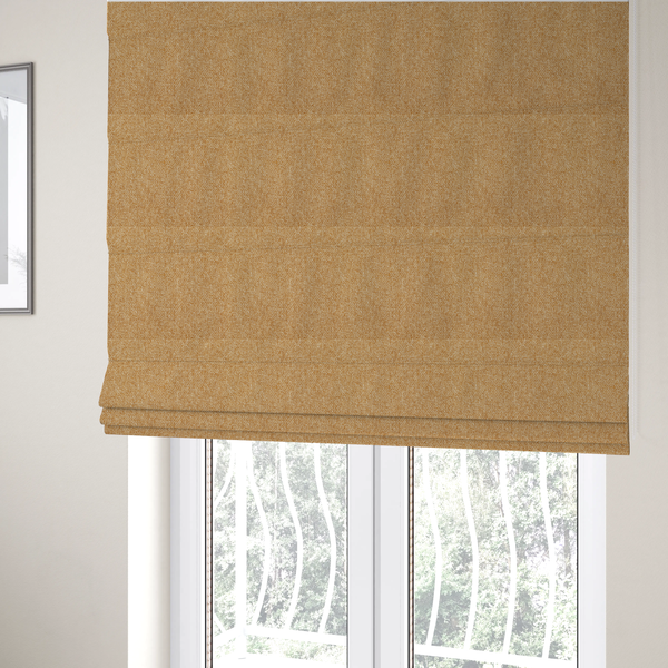 The fabric used to create these Roman blinds is a Chamonix Water Repellent upholstery fabric in Yellow. The material features a dense, multi-tonal basket weave texture with sunny golden and cream threads and a durable, matte finish.