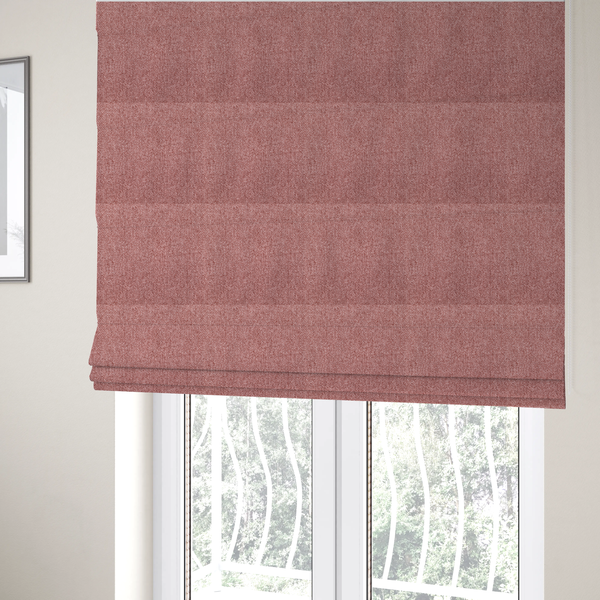 The fabric used to create these Roman blinds is a Chamonix Water Repellent upholstery fabric in Pink. The material features a dense, dusty rose basket weave texture with a multi-tonal finish and a durable, matte look.
