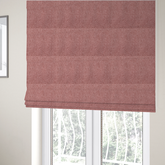 The fabric used to create these Roman blinds is a Chamonix Water Repellent upholstery fabric in Pink. The material features a dense, dusty rose basket weave texture with a multi-tonal finish and a durable, matte look.