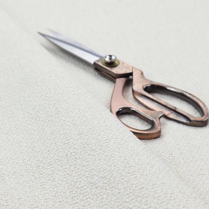 A Chamonix Water Repellent upholstery fabric in White. The material features a dense, textured basket weave with a clean, matte finish and high-durability construction.