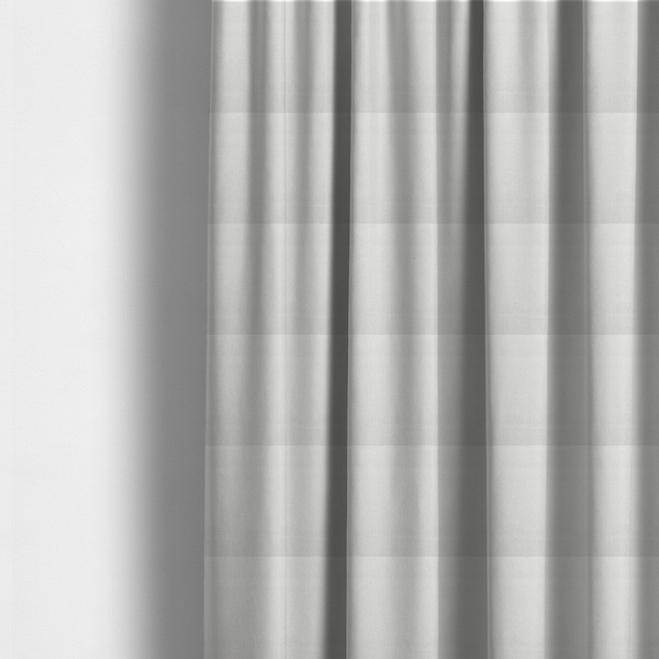 The fabric used to create these made-to-measure curtains is a Chamonix Water Repellent upholstery fabric in White. The material features a dense, textured basket weave with a clean, matte finish and high-durability construction.