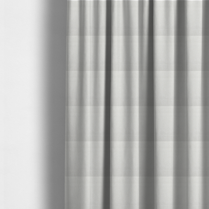 The fabric used to create these made-to-measure curtains is a Chamonix Water Repellent upholstery fabric in White. The material features a dense, textured basket weave with a clean, matte finish and high-durability construction.