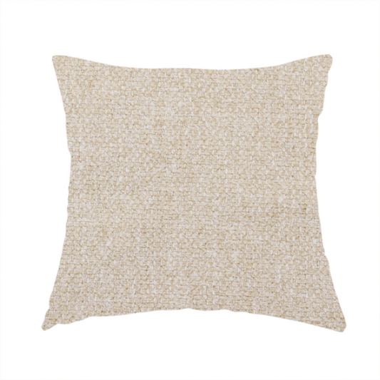 The fabric used to create this handmade cushion is a Chamonix Water Repellent upholstery fabric in Cream. The material features a dense, multi-tonal basket weave texture with warm ivory and off-white threads and a durable, matte finish.
