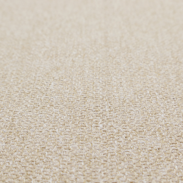 A Chamonix Water Repellent upholstery fabric in Cream. The material features a dense, multi-tonal basket weave texture with warm ivory and off-white threads and a durable, matte finish.