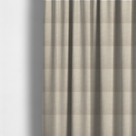 The fabric used to create these made-to-measure curtains is a Chamonix Water Repellent upholstery fabric in Cream. The material features a dense, multi-tonal basket weave texture with warm ivory and off-white threads and a durable, matte finish.