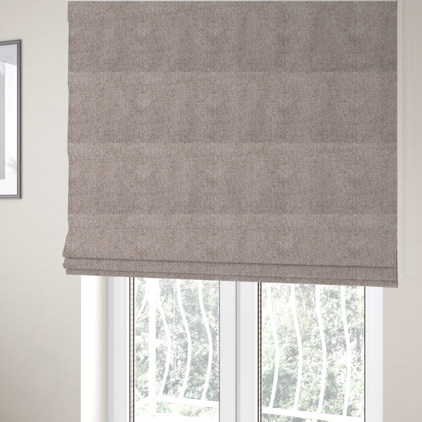 The fabric used to create these Roman blinds is a Chamonix Water Repellent upholstery fabric in light brown. The material features a dense basket weave texture with oatmeal and cream tones and a durable, matte finish.