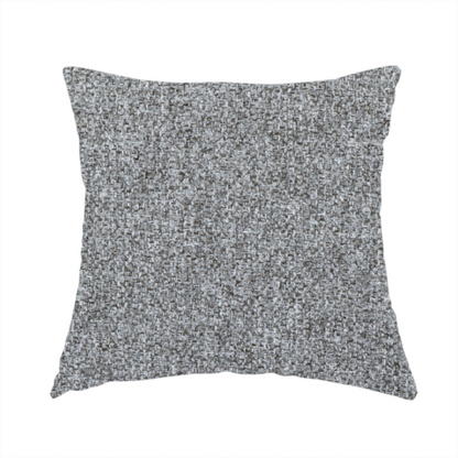 The fabric used to create these handmade cushions is a Chamonix Water Repellent upholstery fabric in Cool Brown. The material features a dense, multi-tonal basket weave texture with taupe and grey threads and a durable, matte finish.