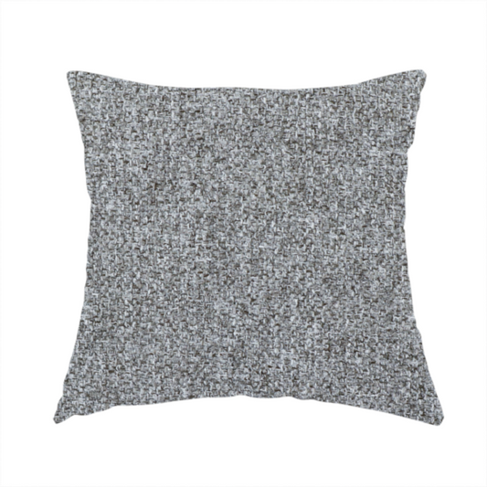 The fabric used to create these handmade cushions is a Chamonix Water Repellent upholstery fabric in Cool Brown. The material features a dense, multi-tonal basket weave texture with taupe and grey threads and a durable, matte finish.