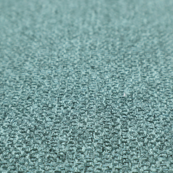 A Chamonix Water Repellent upholstery fabric in Emerald Green. The material features a dense, jewel-toned basket weave texture with a multi-tonal finish and a durable, matte look.